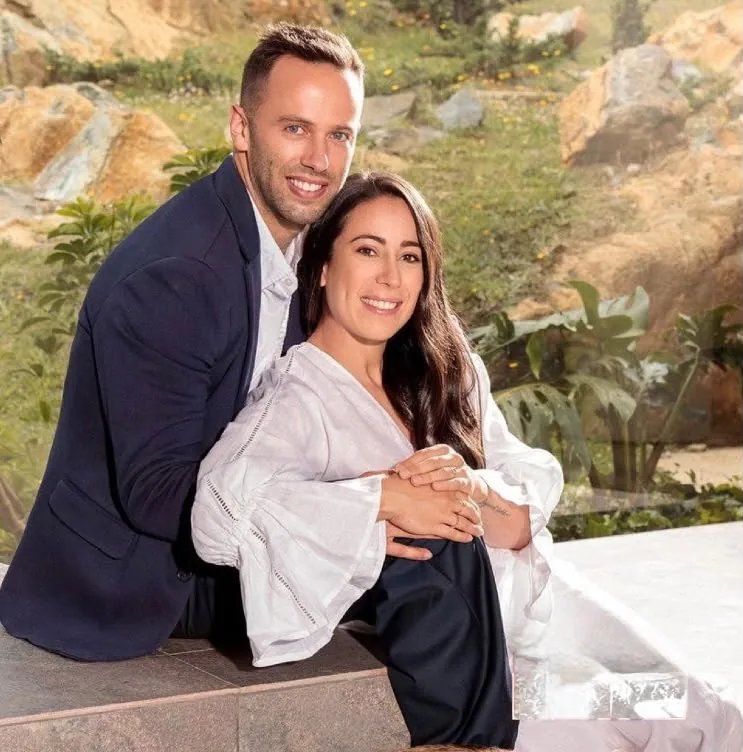 Couple embracing during an outdoor photo session